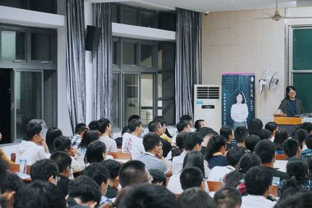 Jackie teaching in a lecture hall